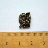 Ornamento de latón caracol 13x10 mm