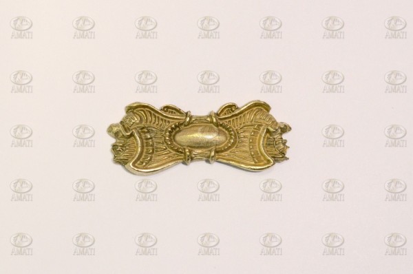 Ornamento de latón 40x16 mm